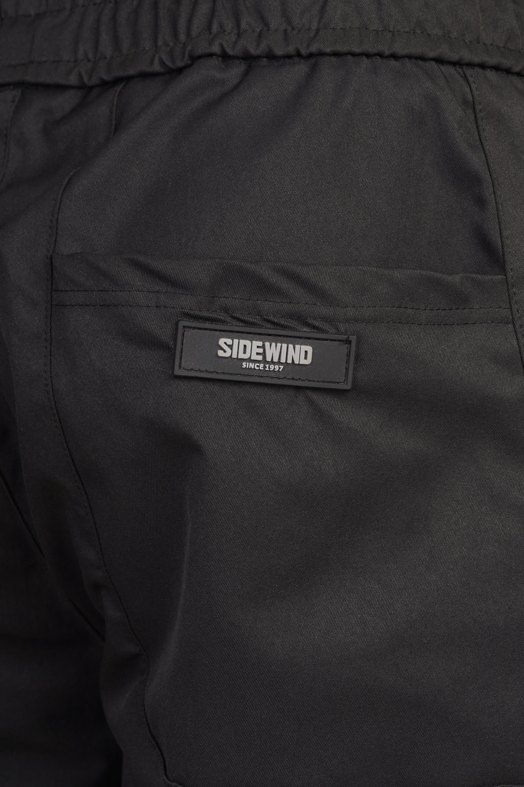 SIDEWIND Panel Stitch Relaxed Pants - Black back view
